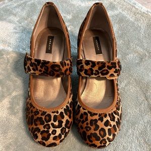 leopard print leather pumps size 7.